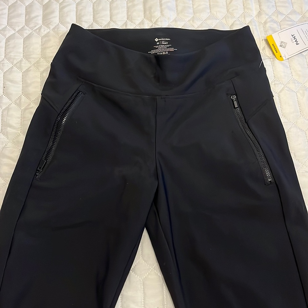 work legging made of 78% nylon, 22% spandex in the front and 100% poly on back